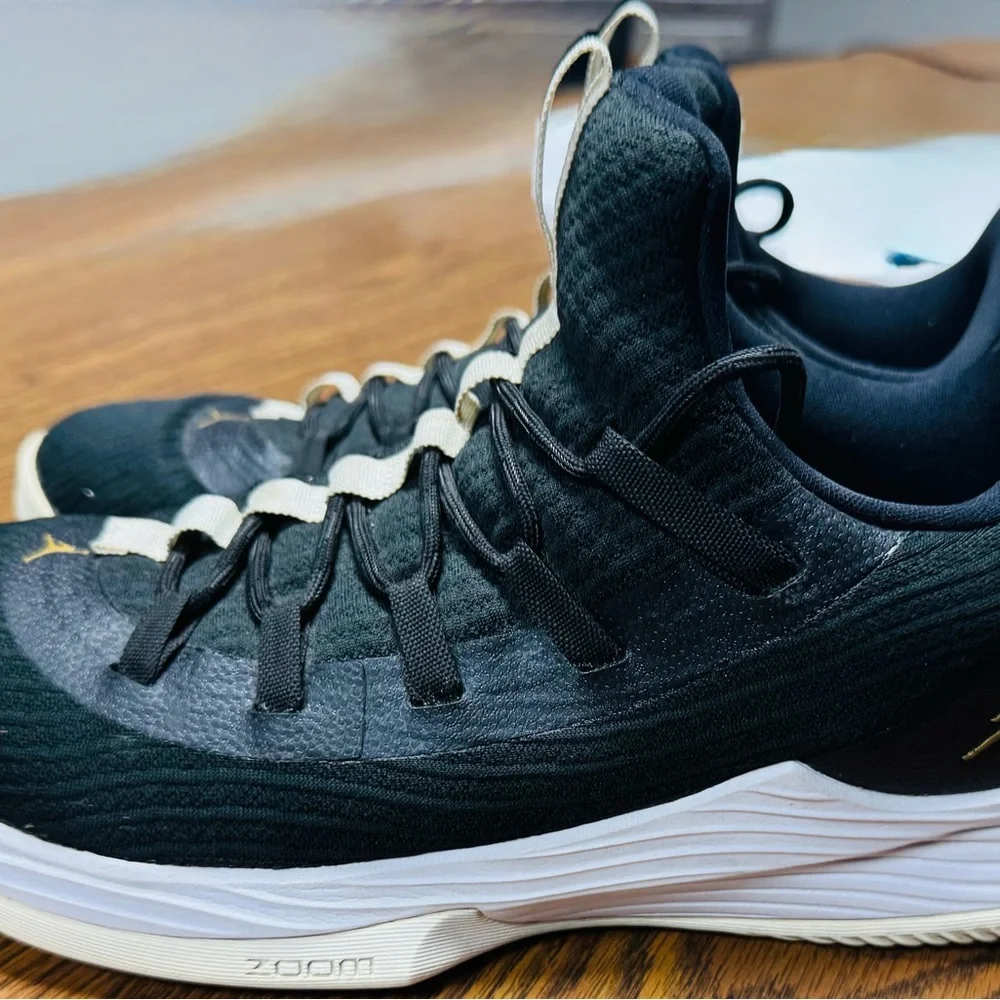 Jordan Men's Black and White Athletic Shoes with Gold Jumpman